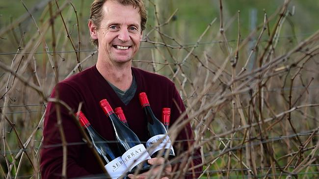 Tom Carson holding $10,000 worth of wine! Picture: Zoe Phillips